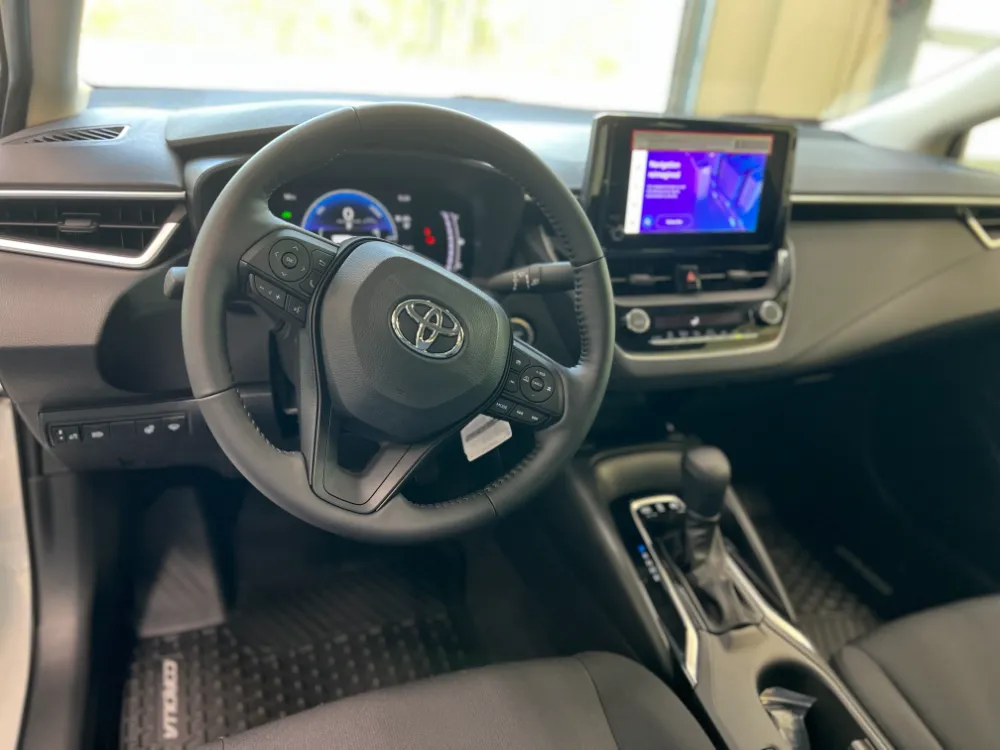 2023 toyota corolla hybrid le white 9